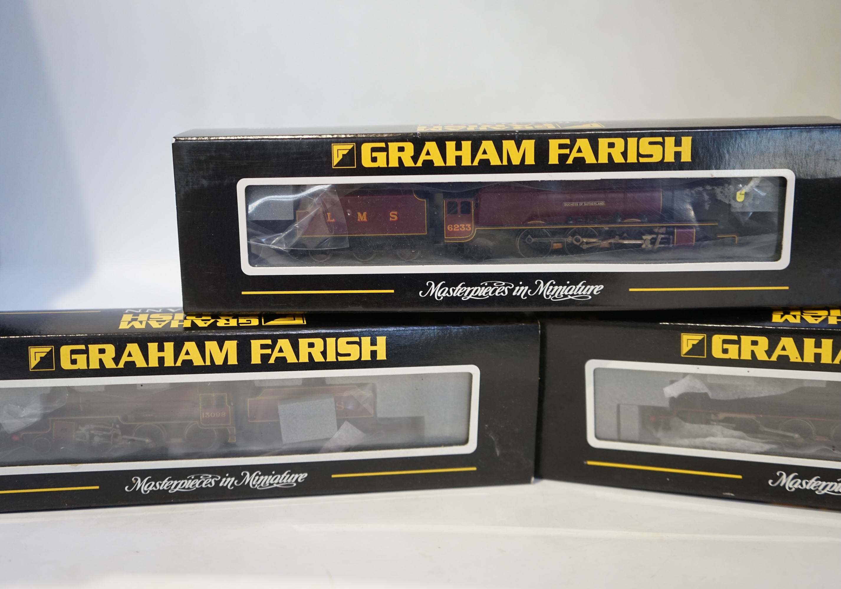 Three boxed Graham Farish N gauge railway LMS tender locomotives; a Midland Crab, 13098 (372-226), a Black Five, 5305 (372-125), and a Coronation Class, Duchess of Sutherland (372-180). Condition - good.